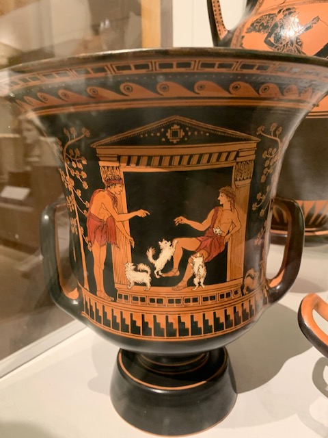 Greek style post with modern scene, descirbed in text.